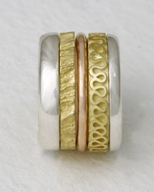 A commissioned Stacking Ring in mixed metals